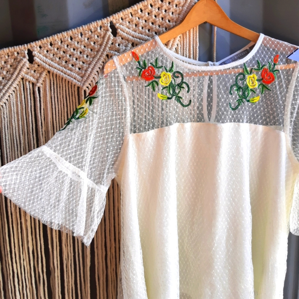 Embroidered floral sheer top. Size large great condition. Valerie Stevens.